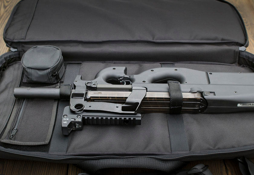 Discreet Rifle Case with FN PS90 inside and accessories shown.