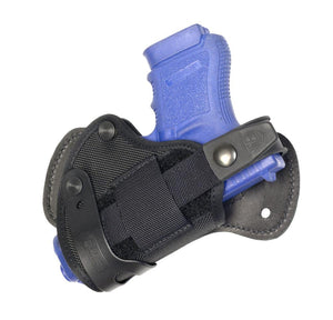 Advanced Back Holster with adjustable tension and a reversible retention strap.