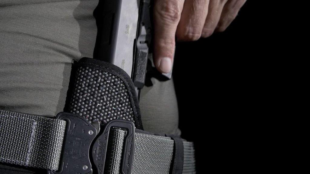 Mainstay Non-Slip IWB Concealment holster with sticky exterior surface pictured with Cobra buckle belt