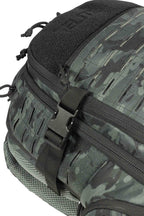 Closeup of CCW backpack, showing laser MOLLE and black camouflage.