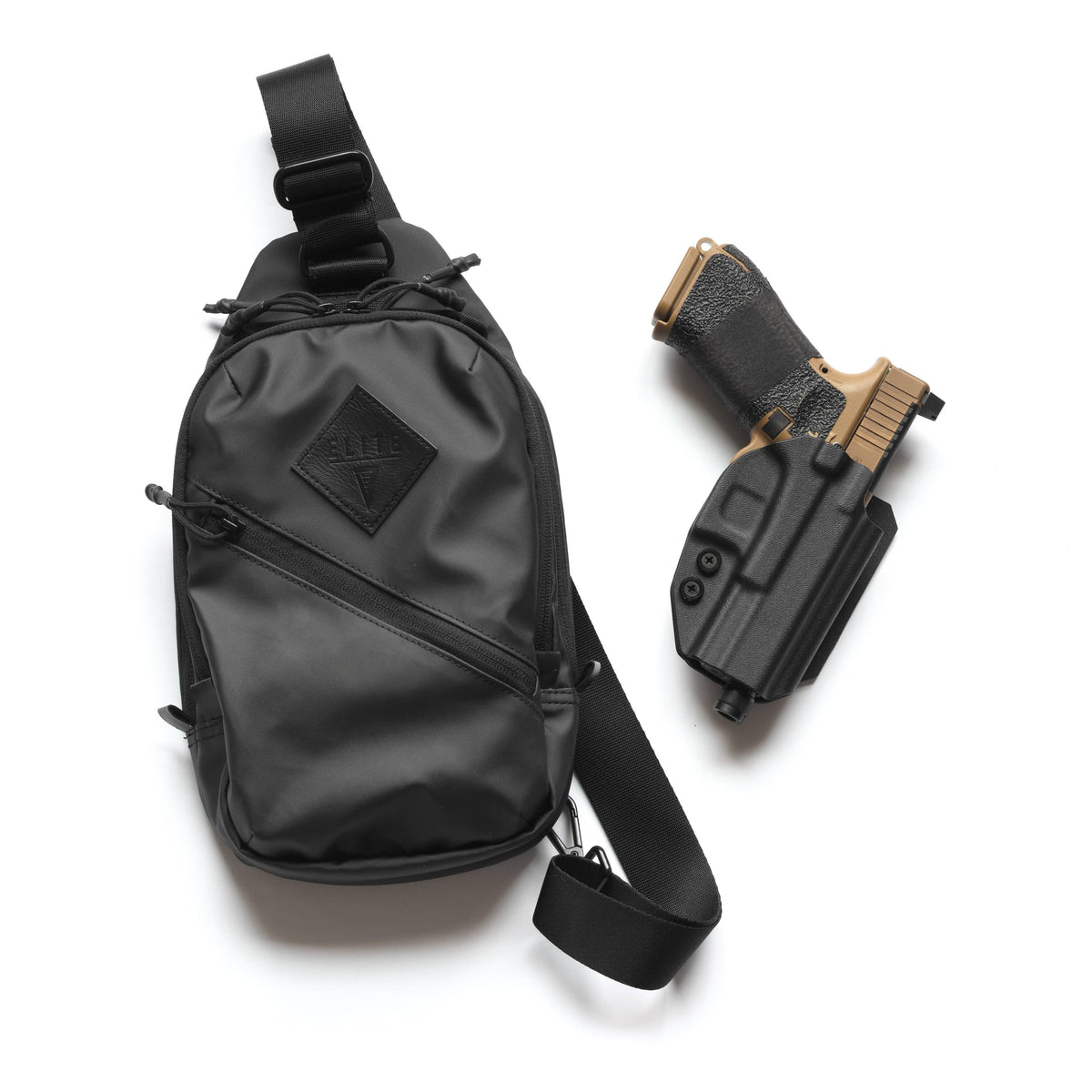 Sentinel sling pack with a Kydex pack holster molded to a light-bearing handgun