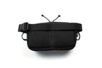 Black waist bag with antenna-like structures on a white background