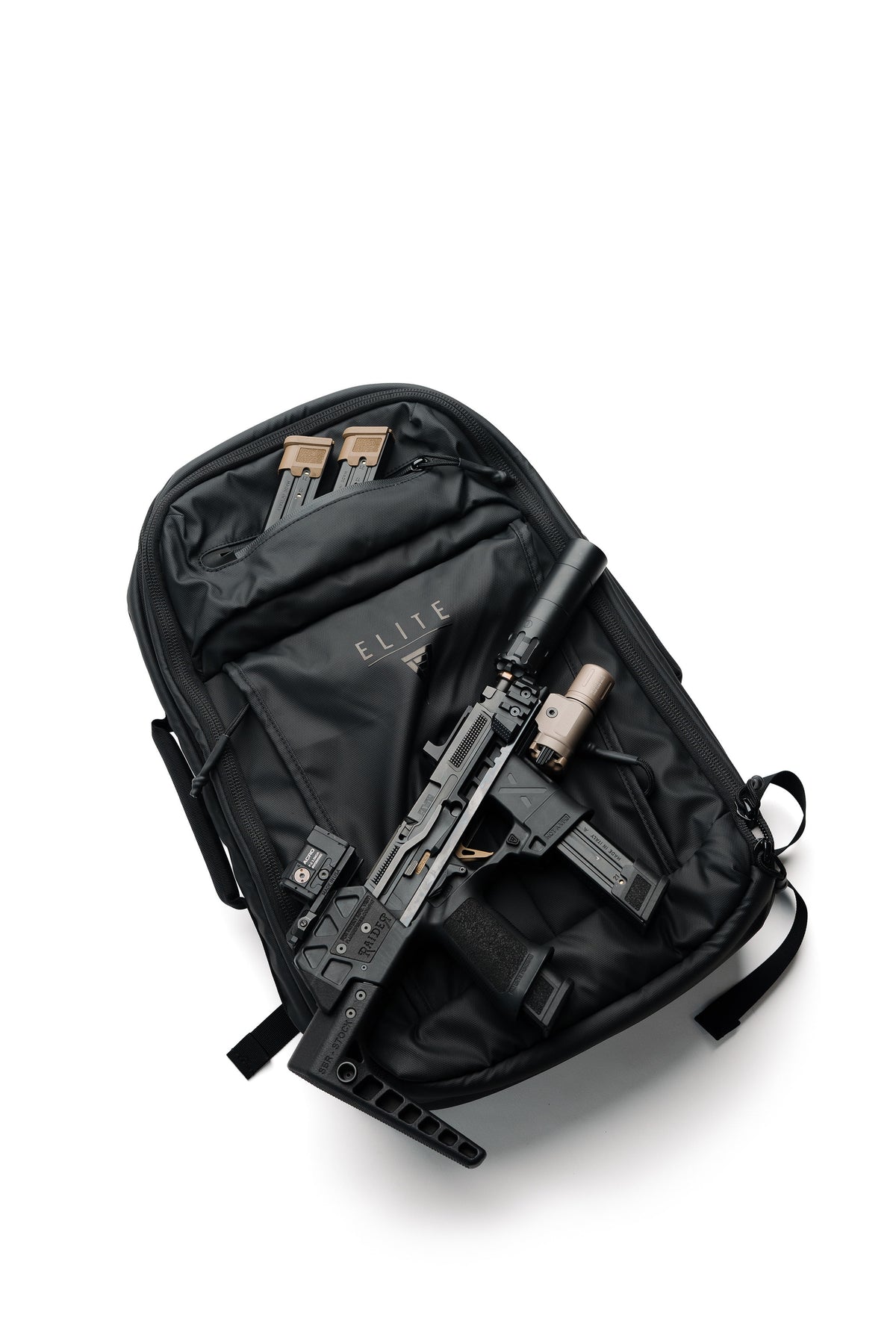 A black tactical backpack shown open from a top-down view, containing a black rifle and handgun, on a white background.