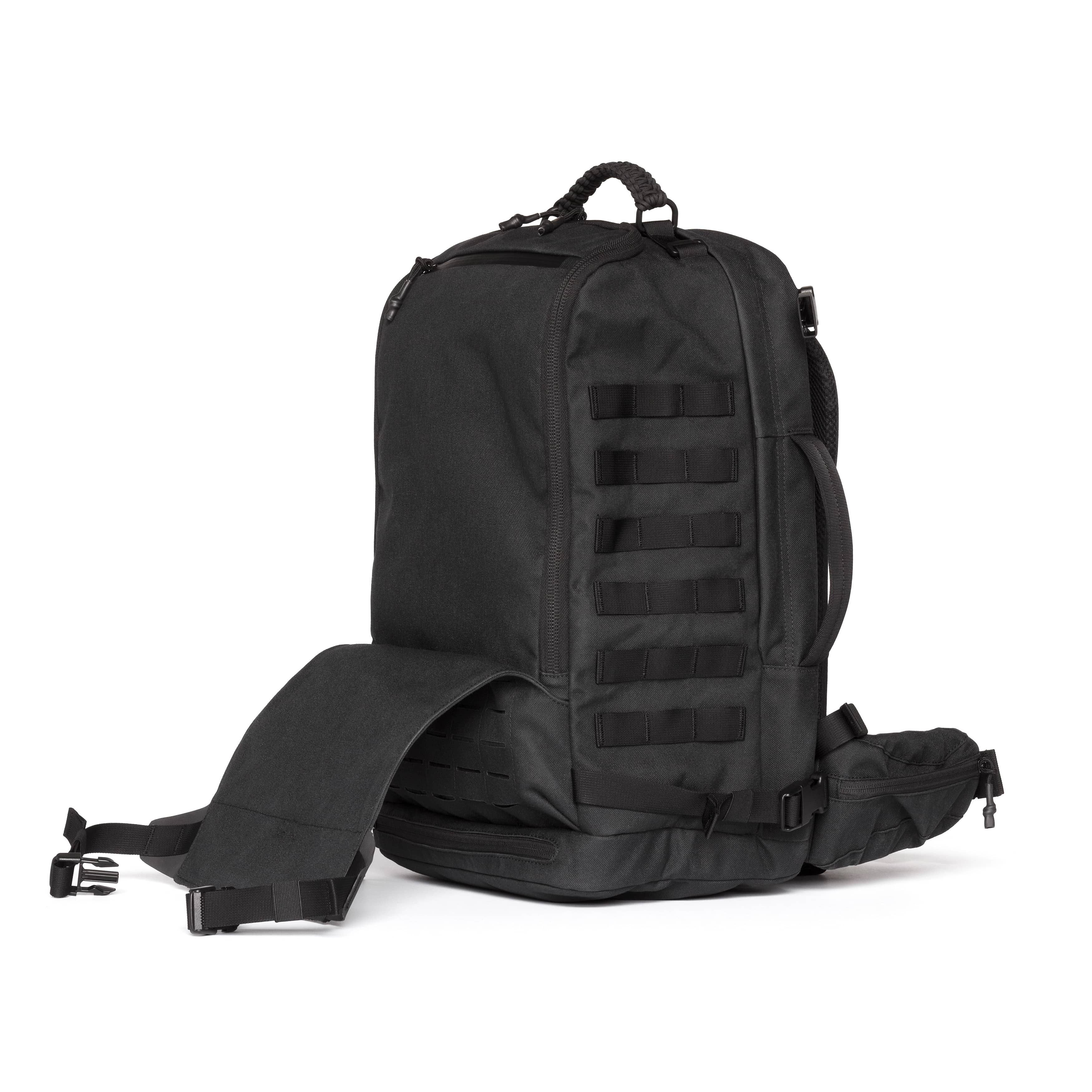 A black tactical backpack with MOLLE webbing on the front, a top carry handle, and an adjustable shoulder strap extended to the left, shown against a plain white background.