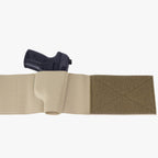 Tan belt with a black gun holster on a white background