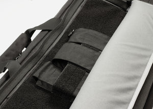 Double Rifle Case with large accessory pocket. Holds velcro modular accessory pouches, fully padded