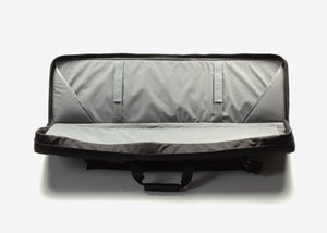 Double Rifle Case with light gray interior, holds two rifles, internal tie-down straps