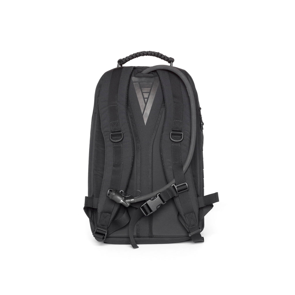 A black tactical backpack shown from the back, featuring padded shoulder straps, a top carry handle, and a quick-release buckle closure, photographed against a solid white background.