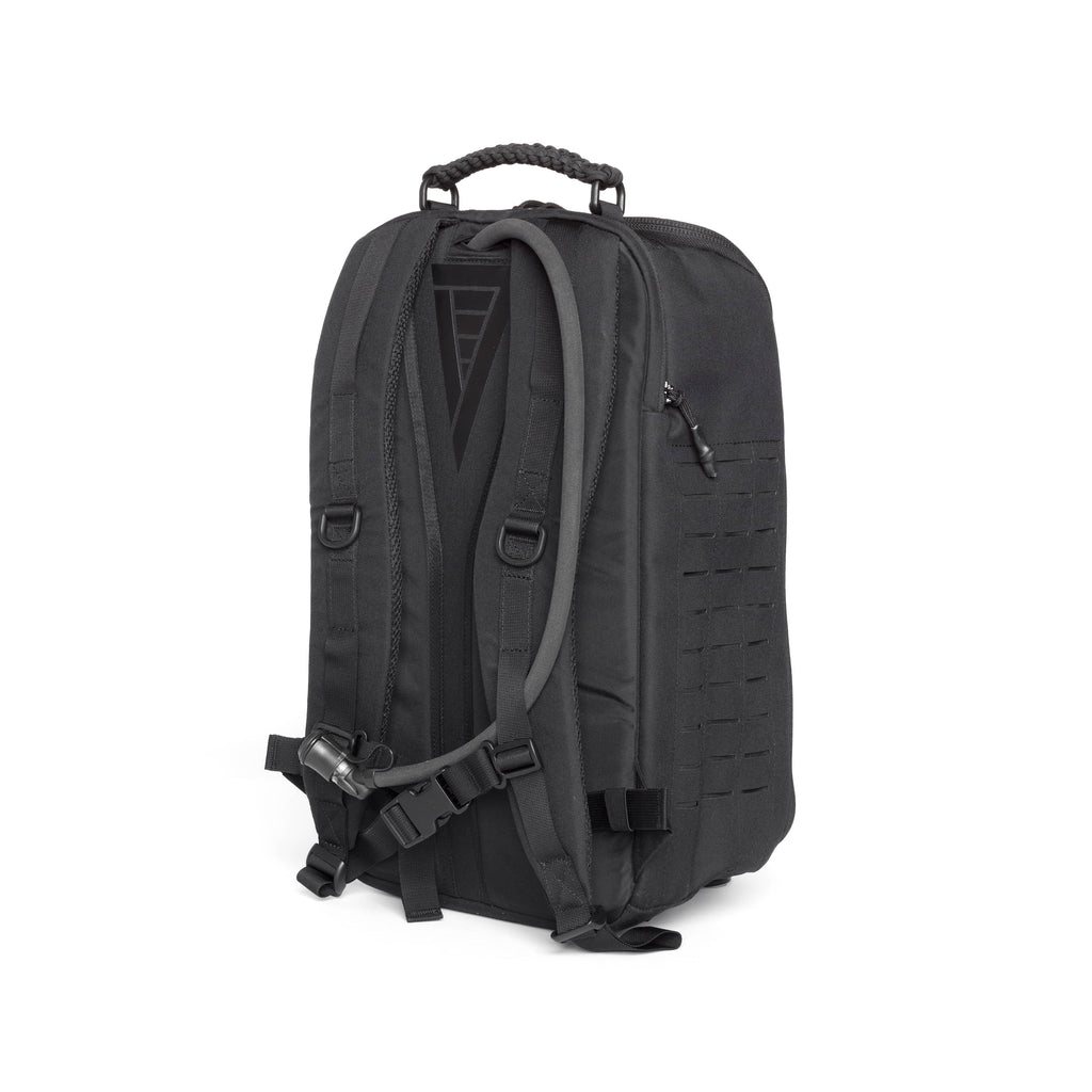 A black tactical backpack shown from a three-quarter rear view, featuring padded shoulder straps, a top carry handle, side compression straps, and a zippered pocket on a plain white background.