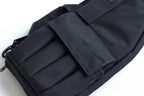 Black tactical magazine pouch on a white background