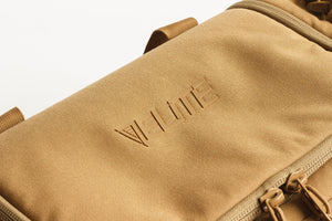 Brown bag with 'Elite' branding on a light gray background