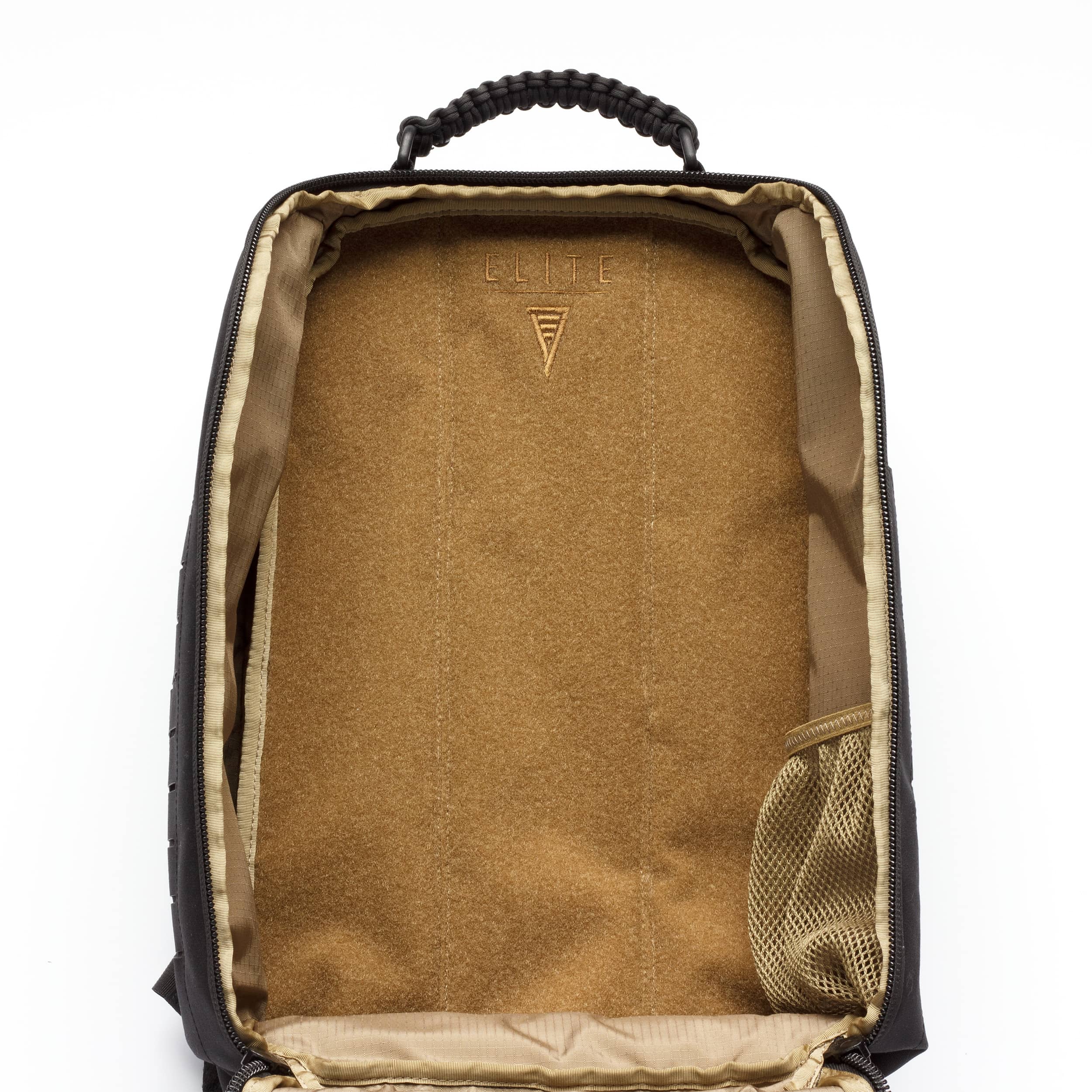 Open view of a backpack showing the tan interior lining, zippered compartments, side mesh pocket, and black top handle on a white background.
