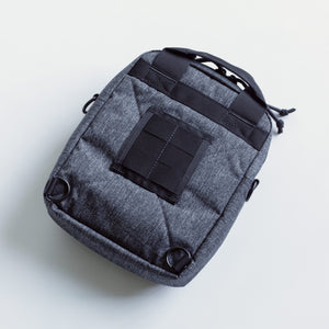 Avenger gun pack back featuring MOLLE panel.