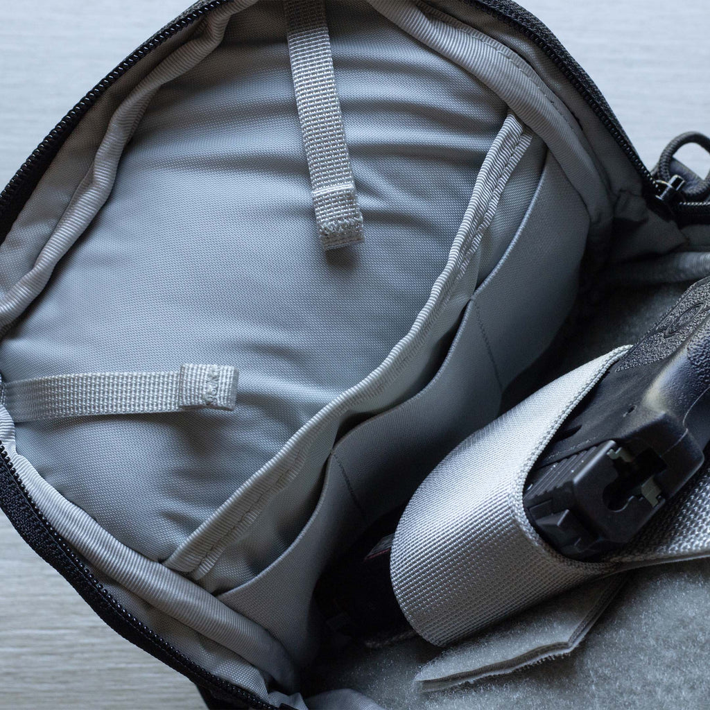 Close up of Elastic Magazine loops and Concelealed Carry Compartment