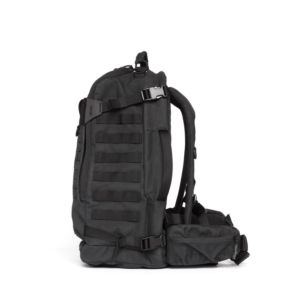A black tactical backpack with MOLLE webbing, side compression straps, and a matching black pouch attached to the side, shown against a plain white background.