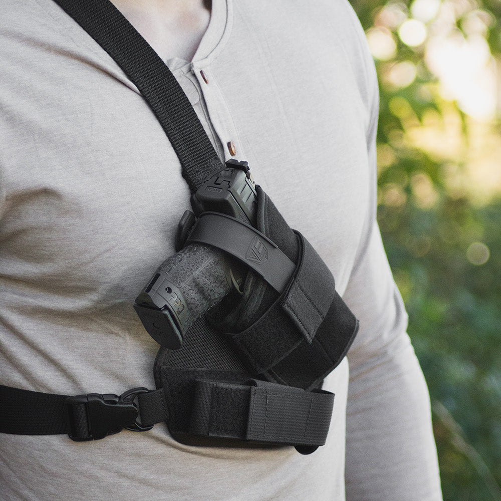 Warden chest holster is adjustable to fit guns with lights/lasers, or red dot sights.