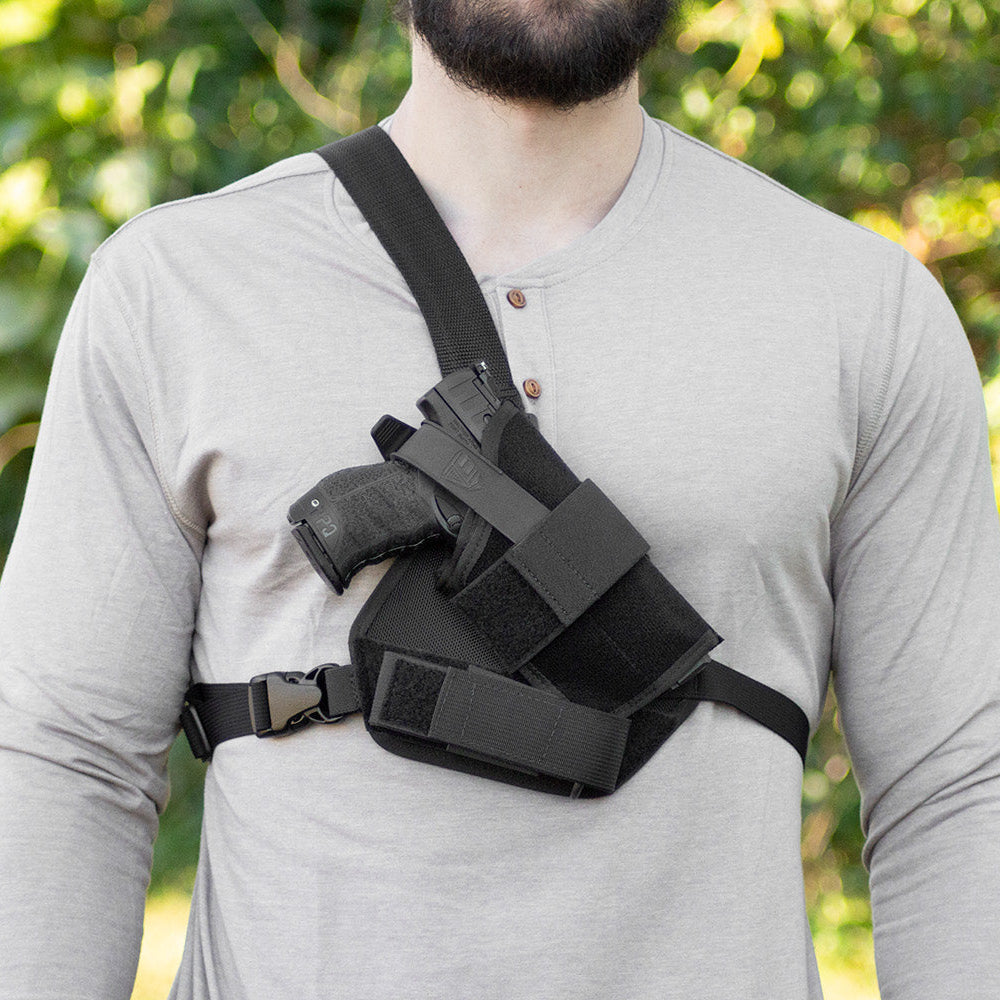 Warden Chest Holster with adjustable harness and adjustable holster. Also available to fit red dot sights. Includes magazine pouch.