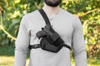 Warden Chest Holster with adjustable harness and adjustable holster. Also available to fit red dot sights. Includes magazine pouch.