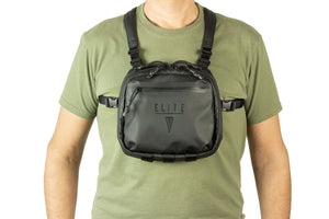 Person wearing a black chest bag with 'ELITE' branding on a white background