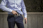 Man with shooters belt drawing gun from Mainstay IWB Holster
