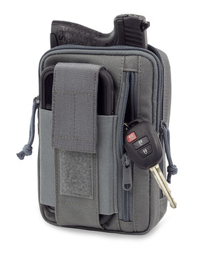 Grey liberty gunpack exterior, shown with phone and keys.