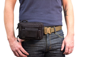 Liberty gunpack being shown horizontal on belt.