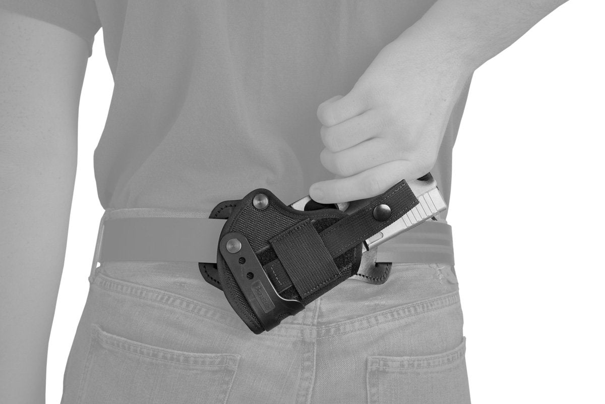 Drawing firearm from our Advanced Back Holster